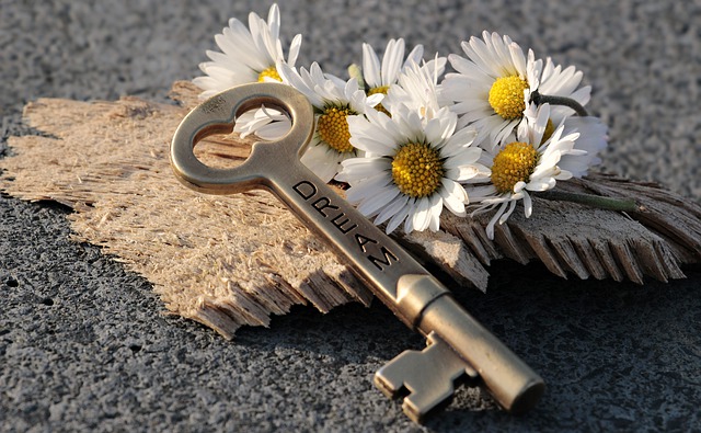 key with the word dream engraved on it
