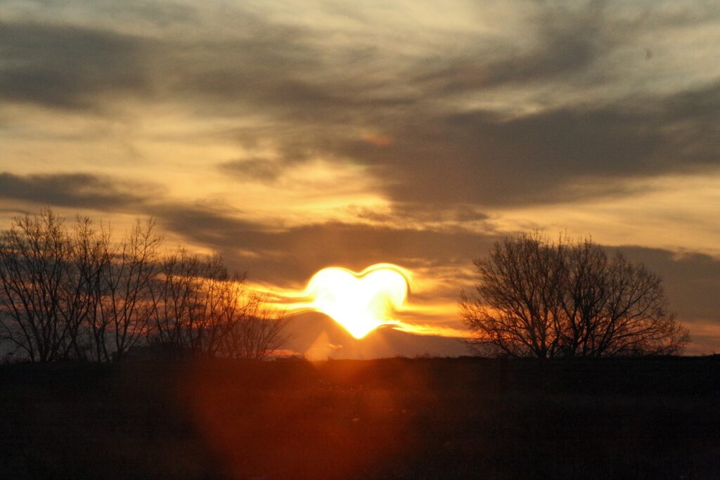 karma moment with heart sunrise