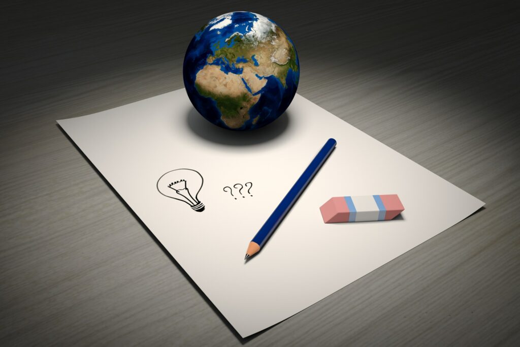 globe and paper and pencil and eraser