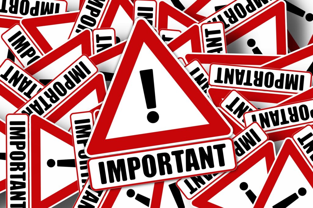 red and black and white traffic signs with the word important on them
