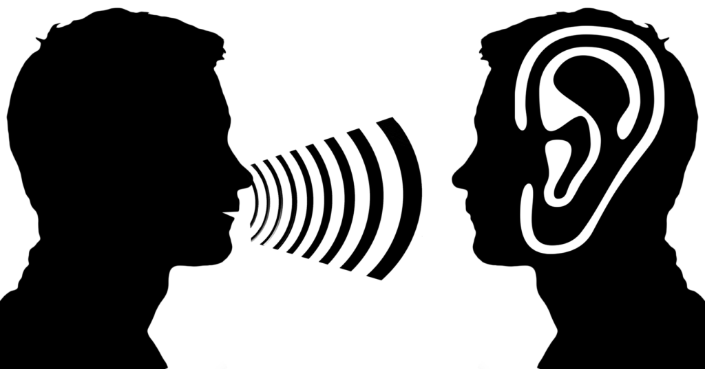 silhouettes of two people one speaking the other listening