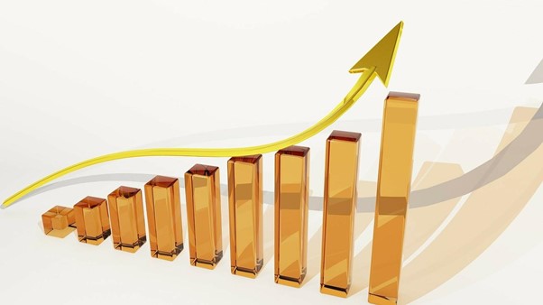 gold bars in form of a graph with upwards arrow showing e-learning growth