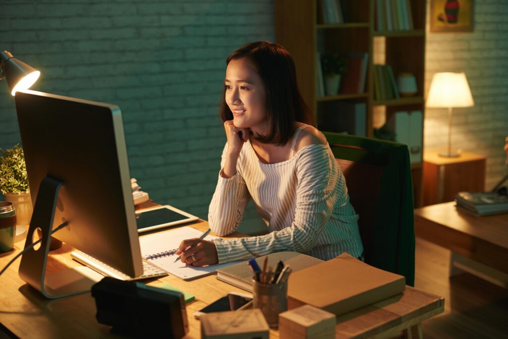 student of online course working at a desk 