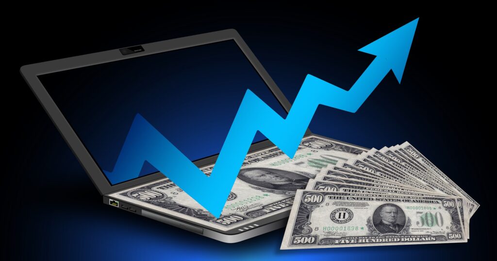laptop with blue upwards arrow and money depicting quick and easy conversion boosting hacks