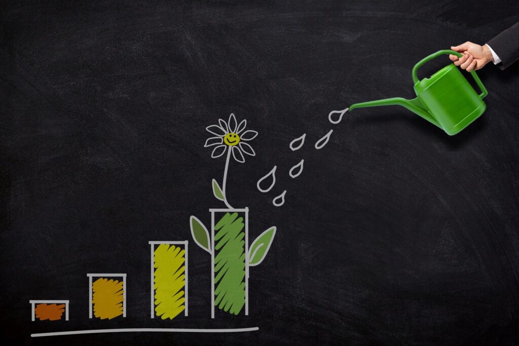 illustration of a person watering a plant depicted on a bar chart showing tips to help grow your business.